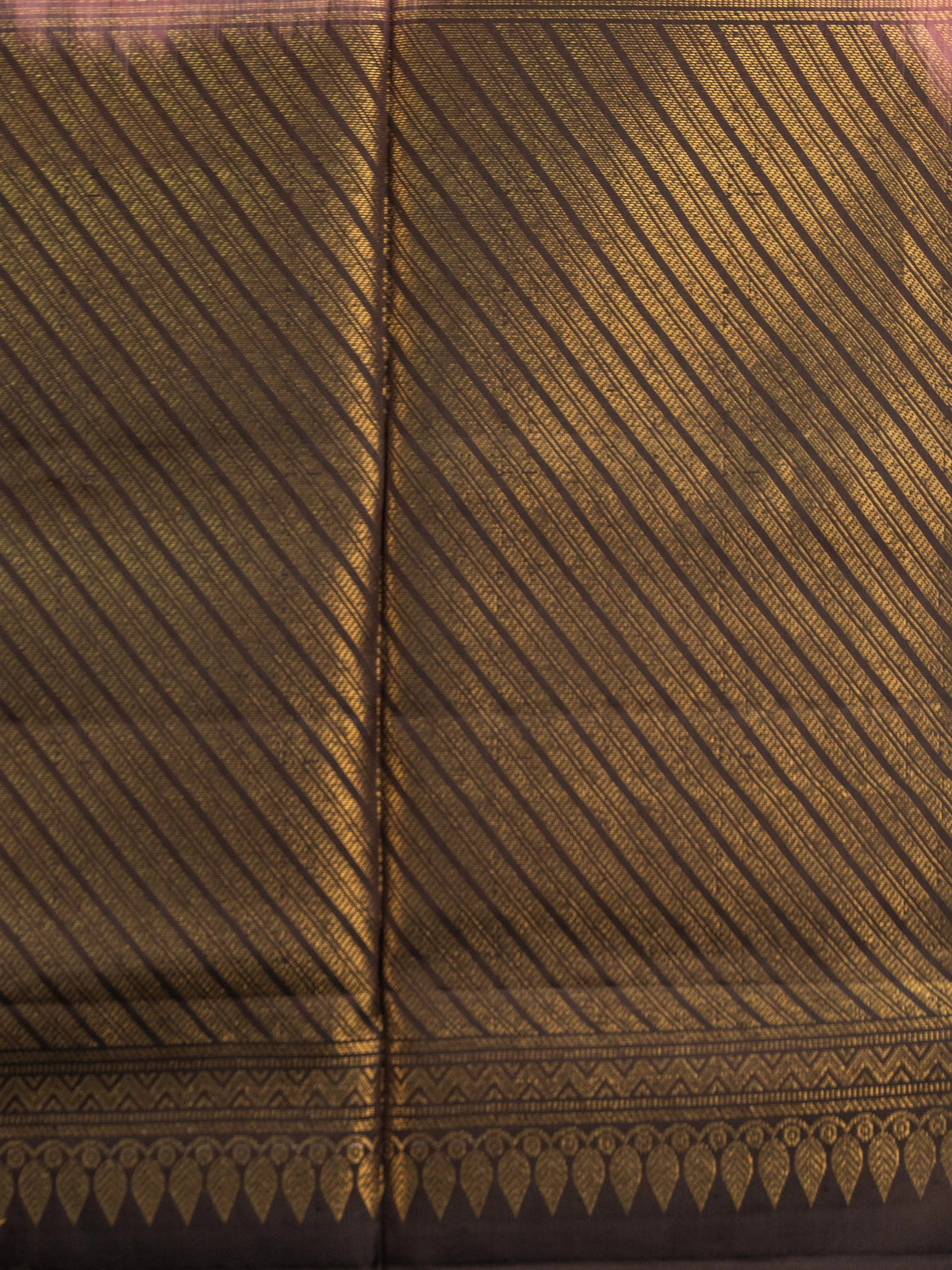 Mauve Kanchipuram Pure Mix saree with dark brown contrast gold zari border and striped pallu