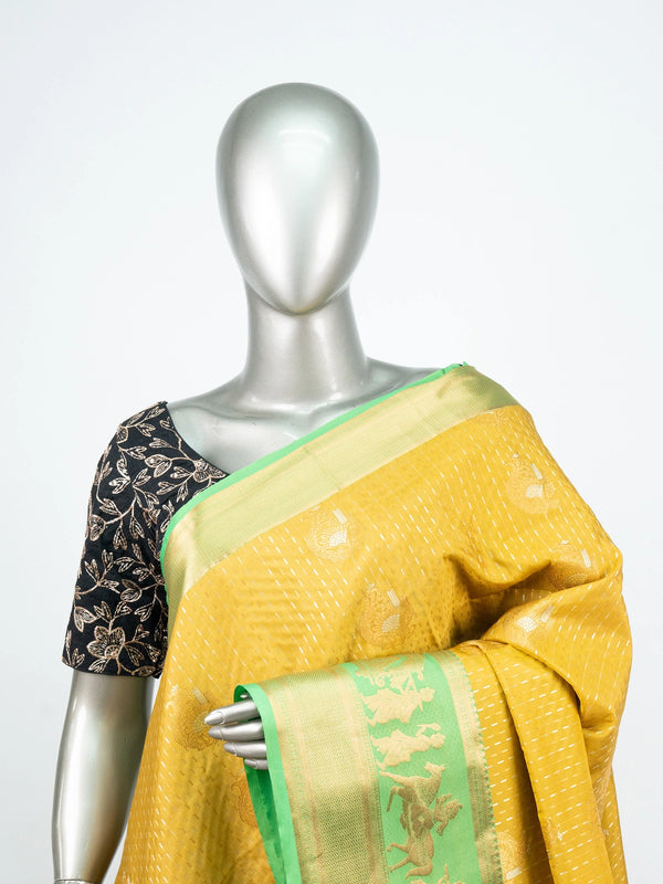 Mustard yellow Vaira Oosi Design semi silk saree with contrast green and gold zari border and floral pallu