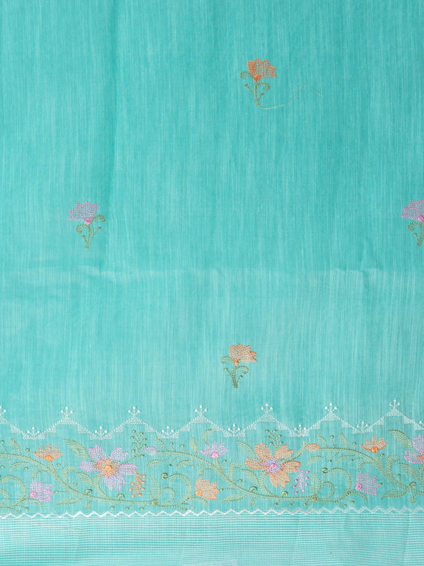 Aqua turquoise linen cotton saree with floral embroidery buttis, silver zari border and embroidered floral pallu