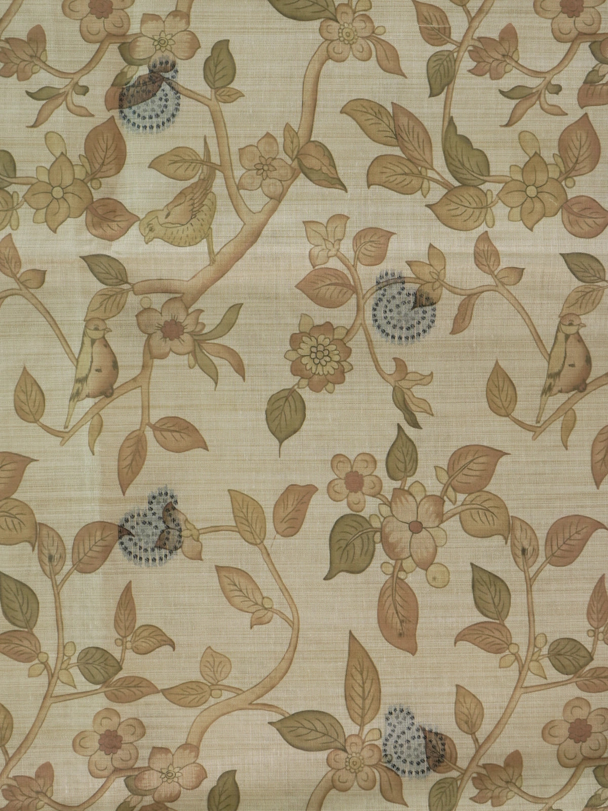 Beige linen cotton saree with kalamkari floral-bird print, grey-green contrast border and deer-motif pallu