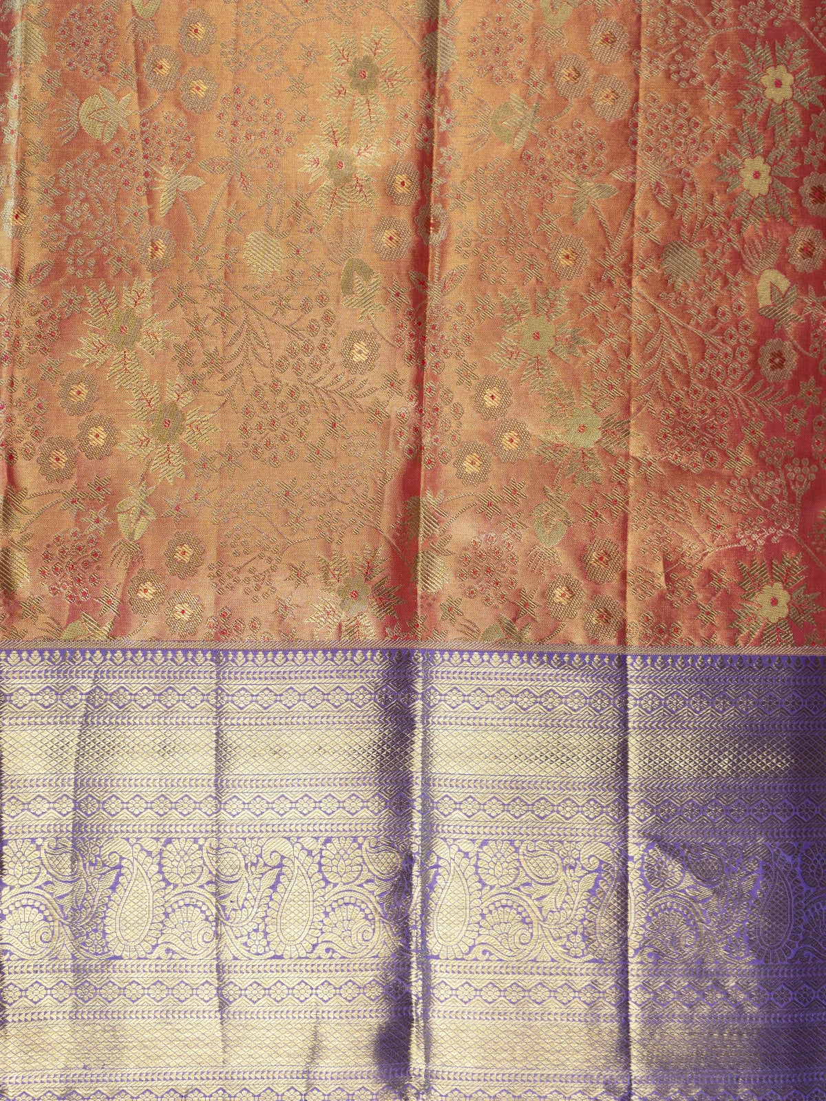 Peach orange pure Kanchipuram silk saree with floral gold zari body and contrast purple border