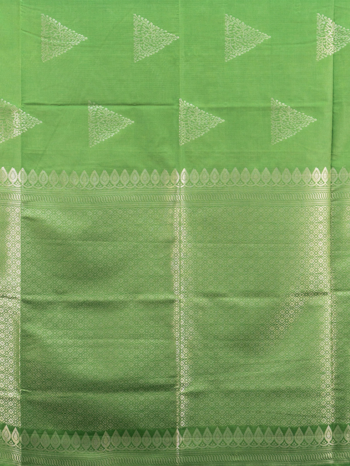 Green Kanchipuram fancy silk saree with contrast mauve zari border and triangular temple zari buttas