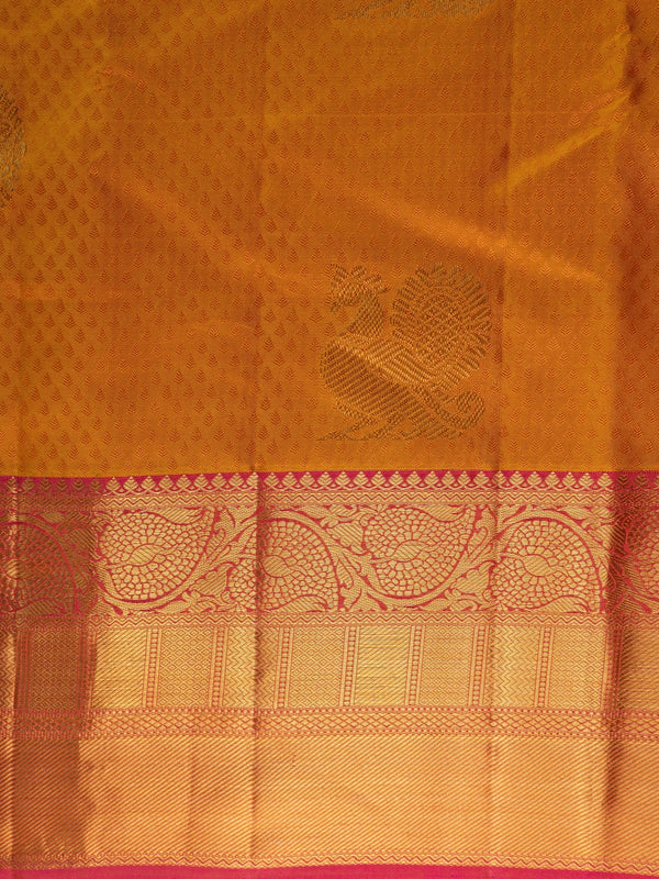 Mustard mustard pure Kanchipuram silk saree with contrast pink gold zari border and zari pallu
