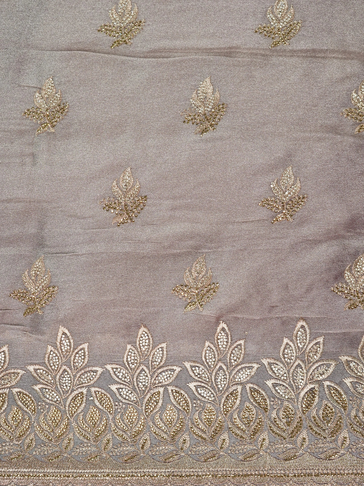 Mauve-grey shimmer designer saree with gold zari and sequin leaf embroidery and scalloped border