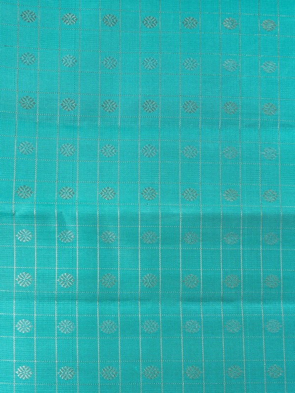Turquoise blue pure Kanchipuram silk saree with silver zari checks, buti motifs and striped zari border
