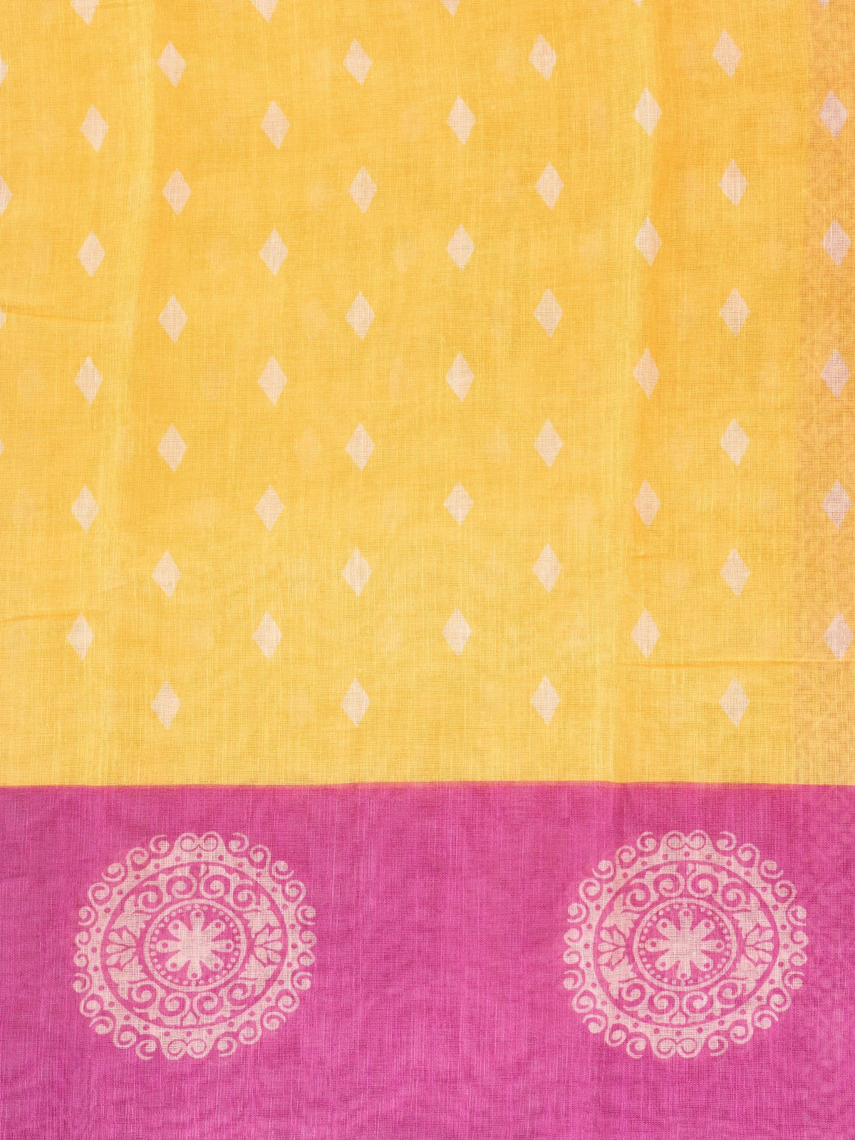 Yellow linen cotton saree with white diamond buttas and contrast pink border and pallu