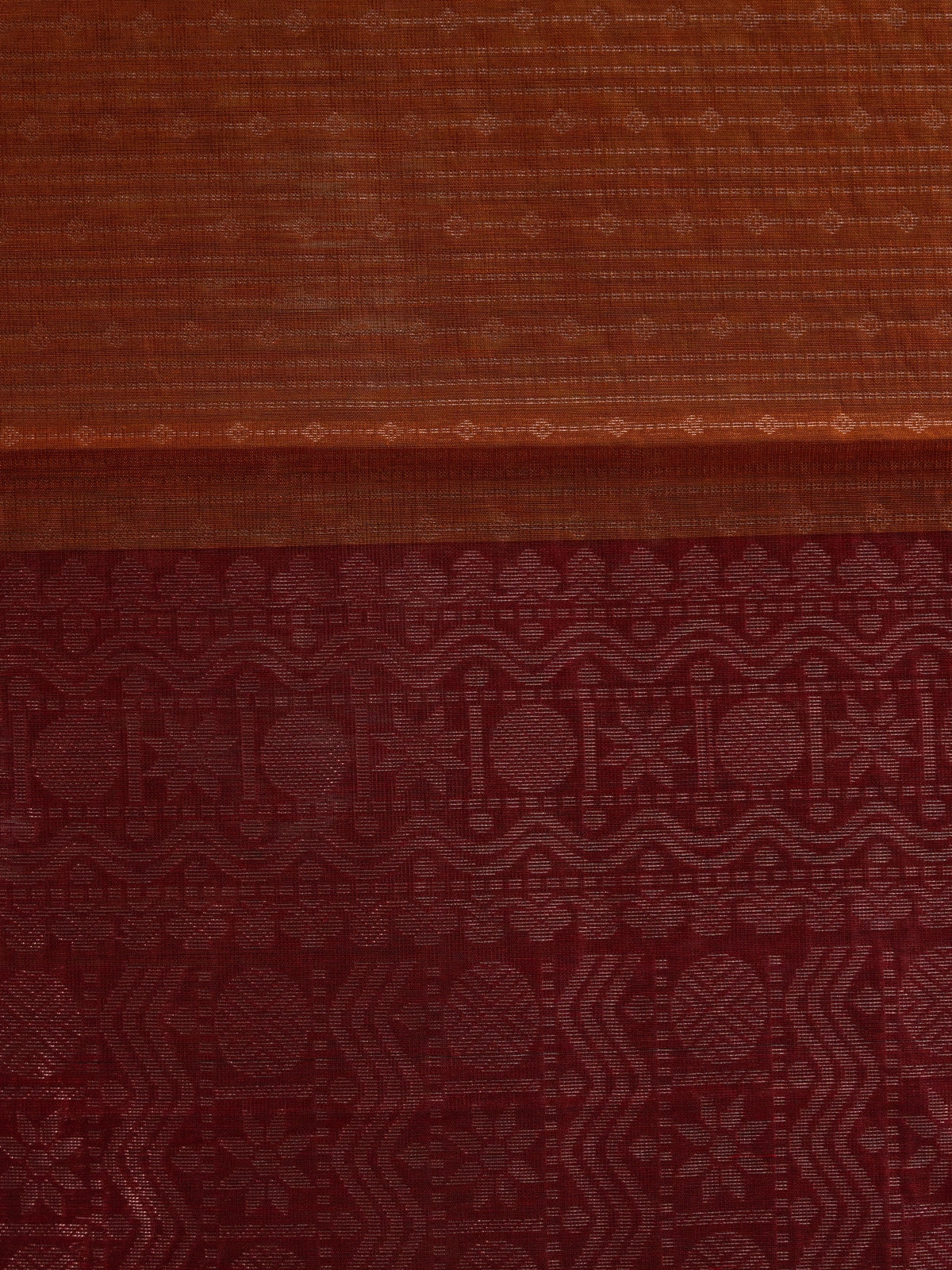 Rust brown silk cotton saree with contrast maroon zari border and woven pallu