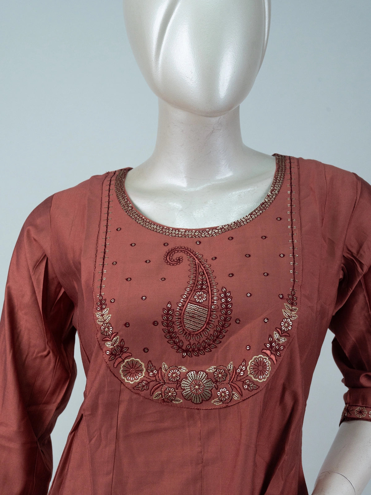 Rust cotton Anarkali kurti set with paisley embroidered yoke, straight pants, and printed cream dupatta