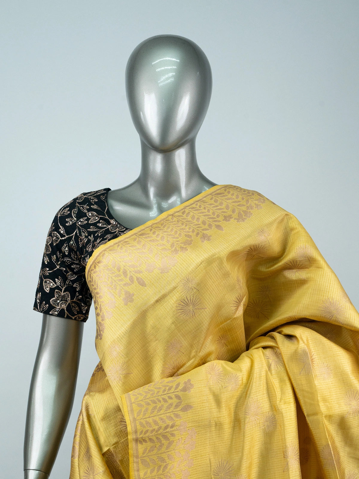 Yellow semi raw silk saree with zari leaf border and multicolour floral pallu