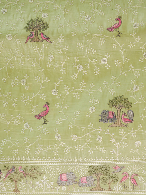 Lime green designer saree with white floral jaal, pink bird, tree and elephant embroidery and matching blouse