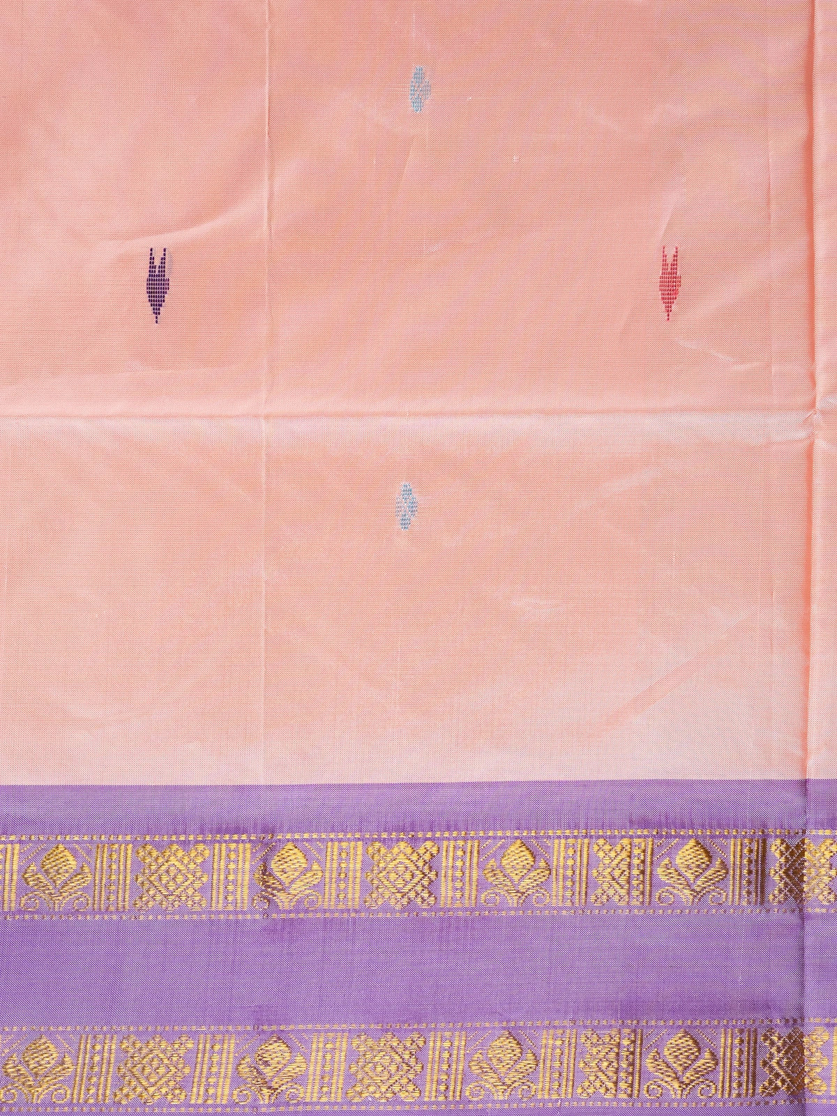 Peach banana silk saree with purple contrast border and gold zari pallu