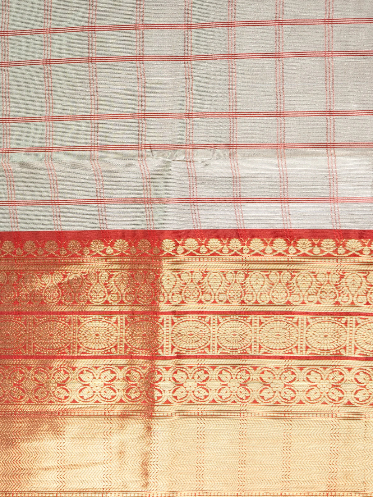 Grey and red checked Kanchi semi silk saree with gold zari border and peach pallu