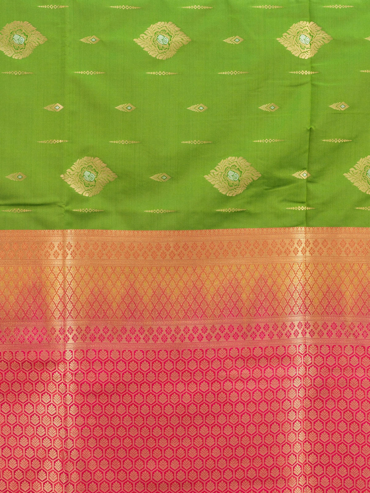 Parrot green semi silk saree with contrast pink gold zari border and floral pallu
