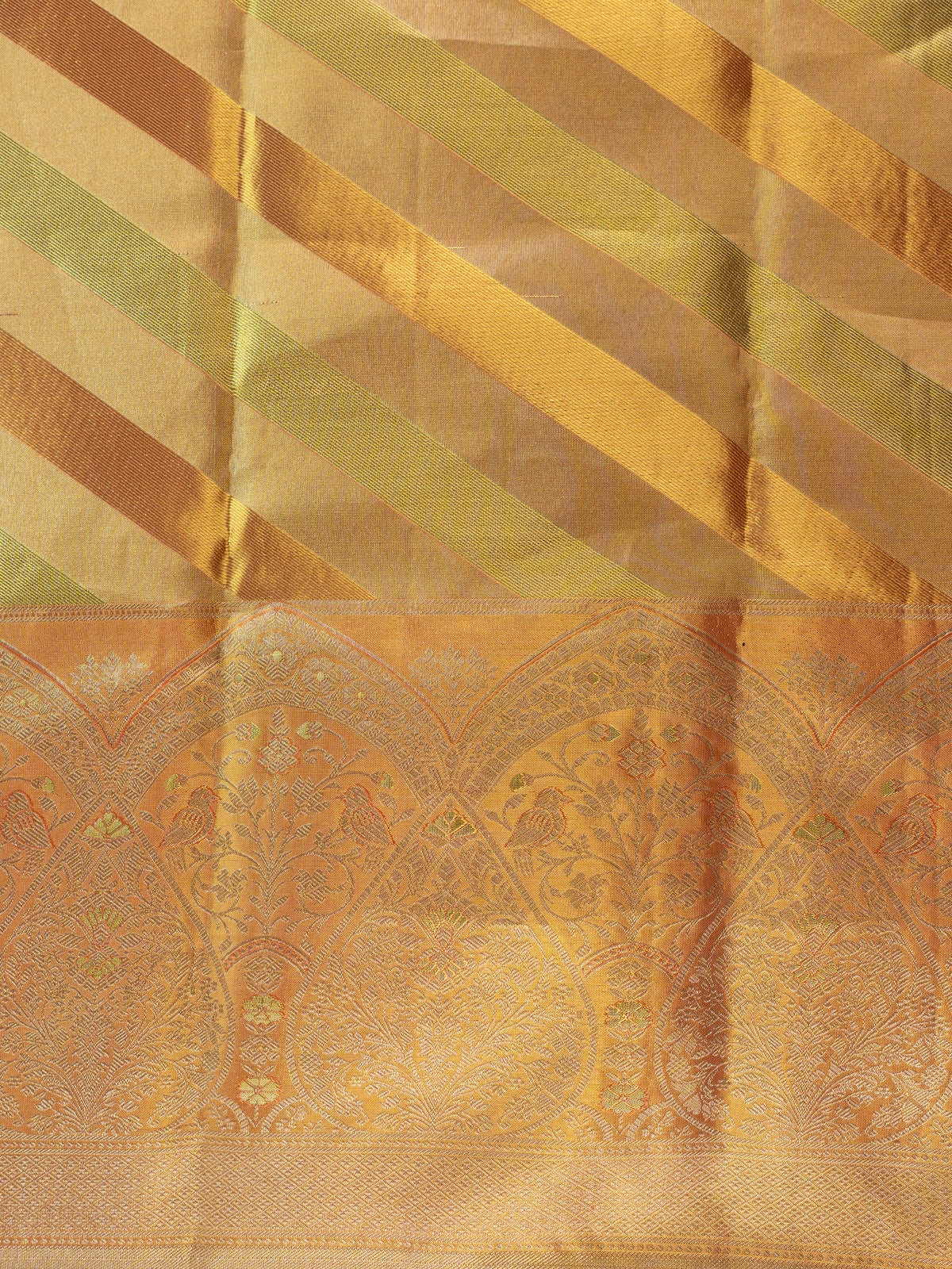 Gold and orange pure Kanchipuram silk saree with diagonal zari stripes and floral zari border