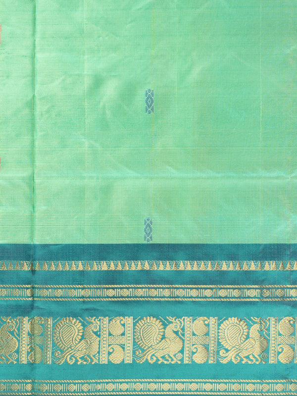 Green Banana Silk saree with teal gold zari peacock border and black striped pallu