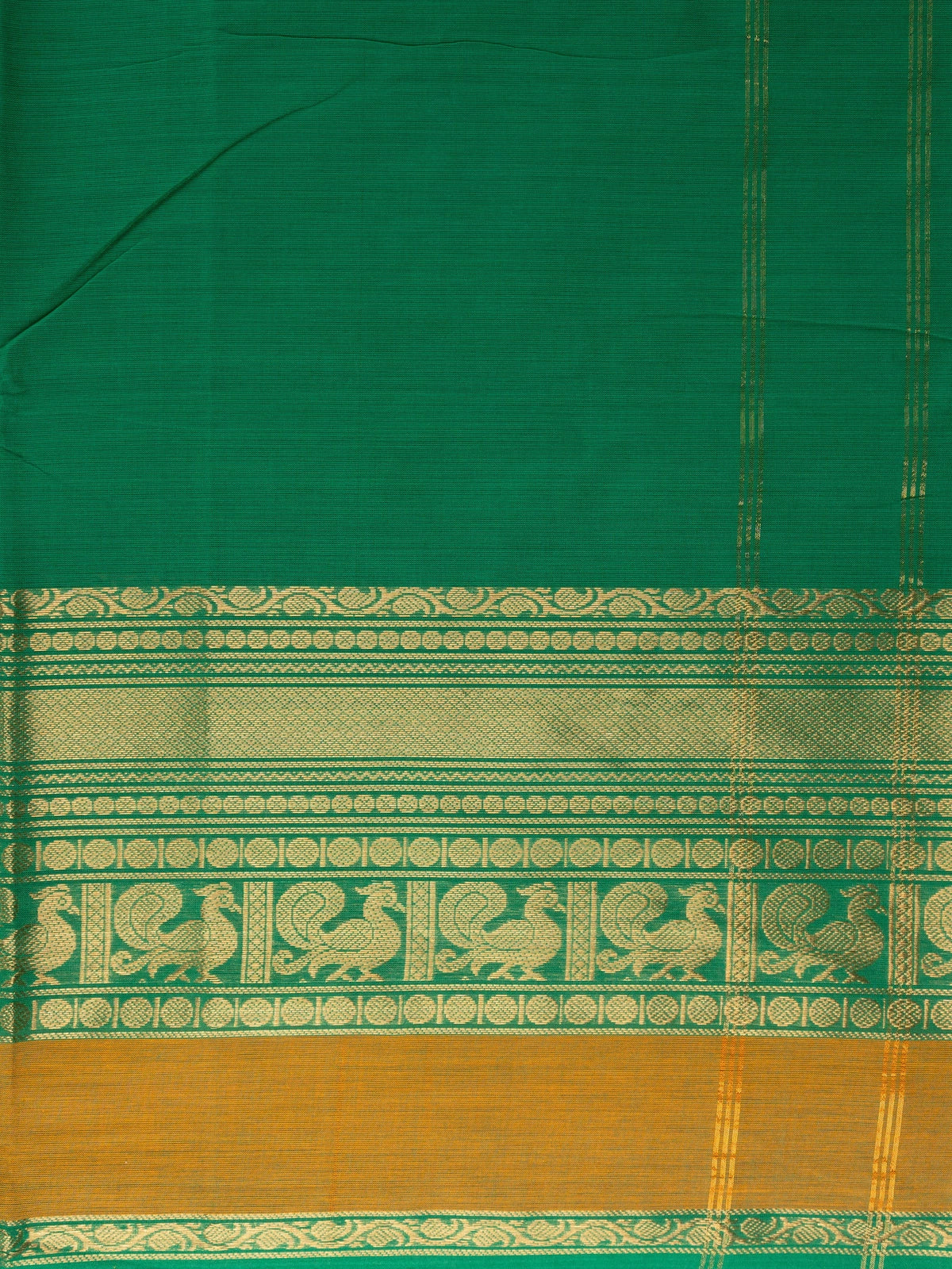 Green Chettinad cotton saree with gold zari peacock-motif border and striped pallu