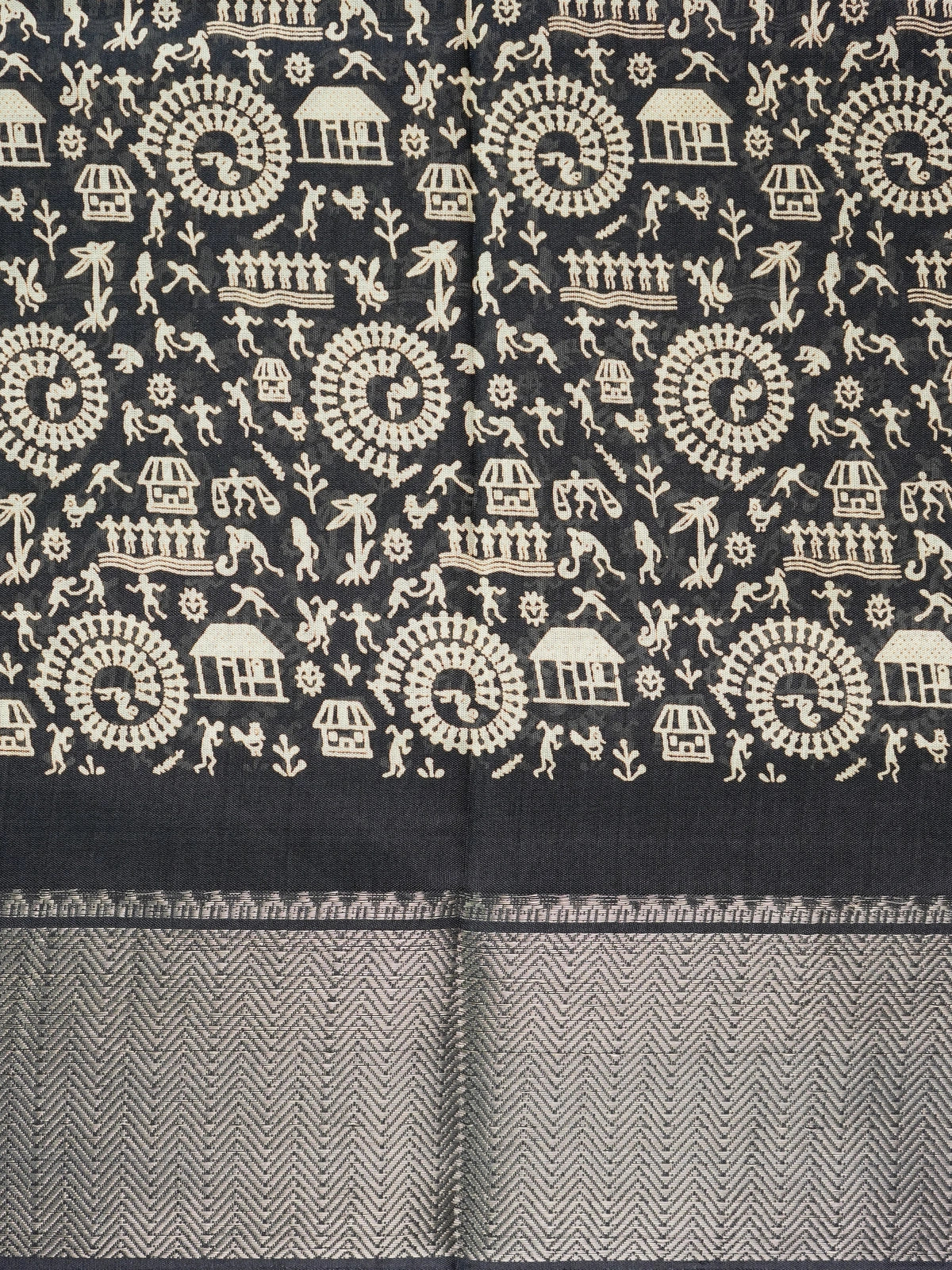 Black designer saree with cream Warli tribal art print and silver zari chevron border