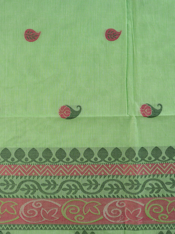 Light green silk cotton saree with pink paisley buttas, contrast grey-green border, and woven floral pallu