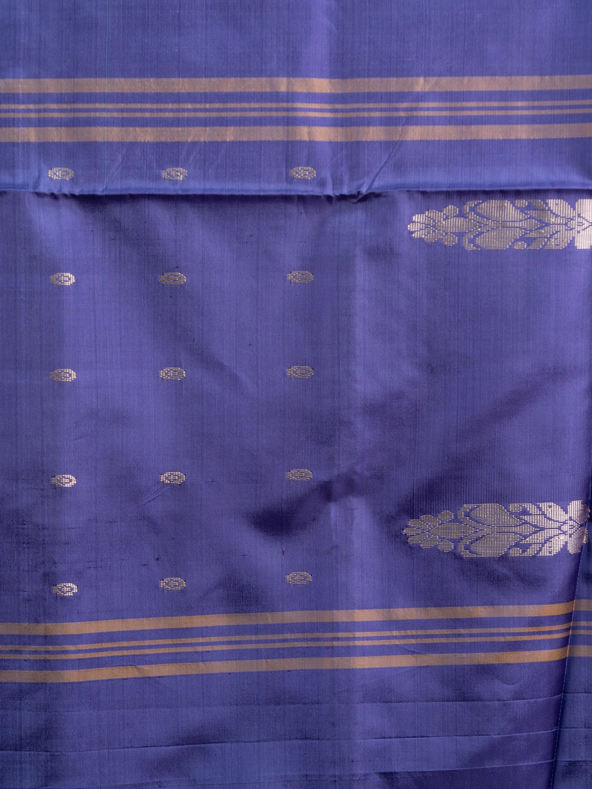 Teal blue banana silk saree with contrast purple pallu and gold zari border