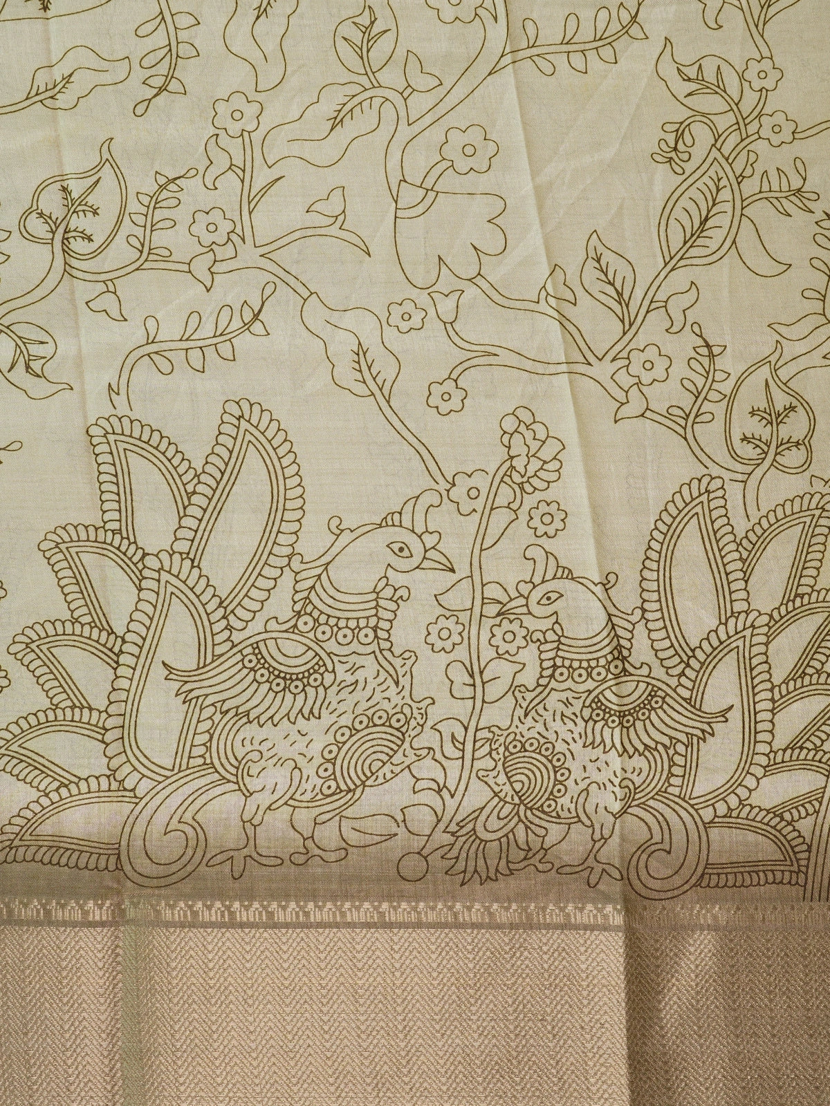 Cream Dola silk saree with Kalamkari-style floral print, peacock pallu and gold zari border