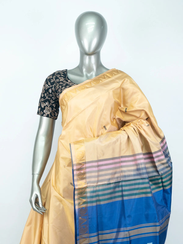 Cream Banana Silk saree with contrast blue pallu and gold zari border