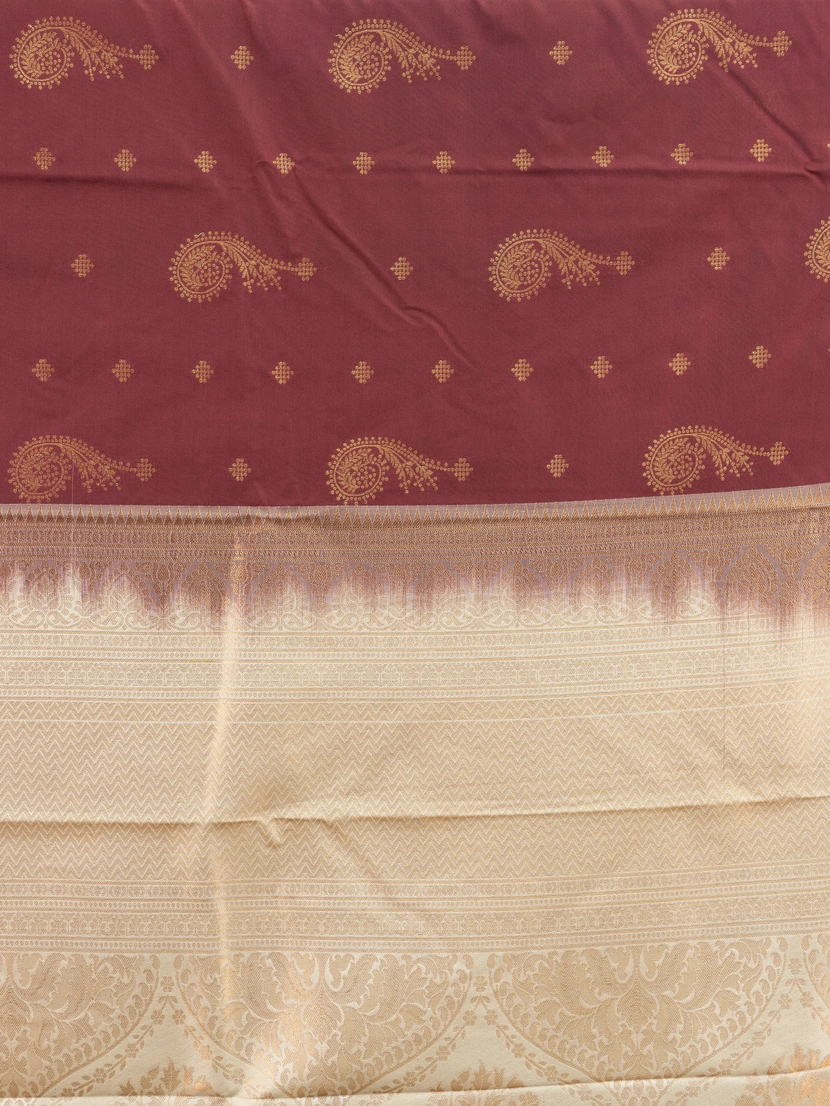 Maroon and cream semi silk saree with gold zari paisley motifs and contrast cream floral zari border