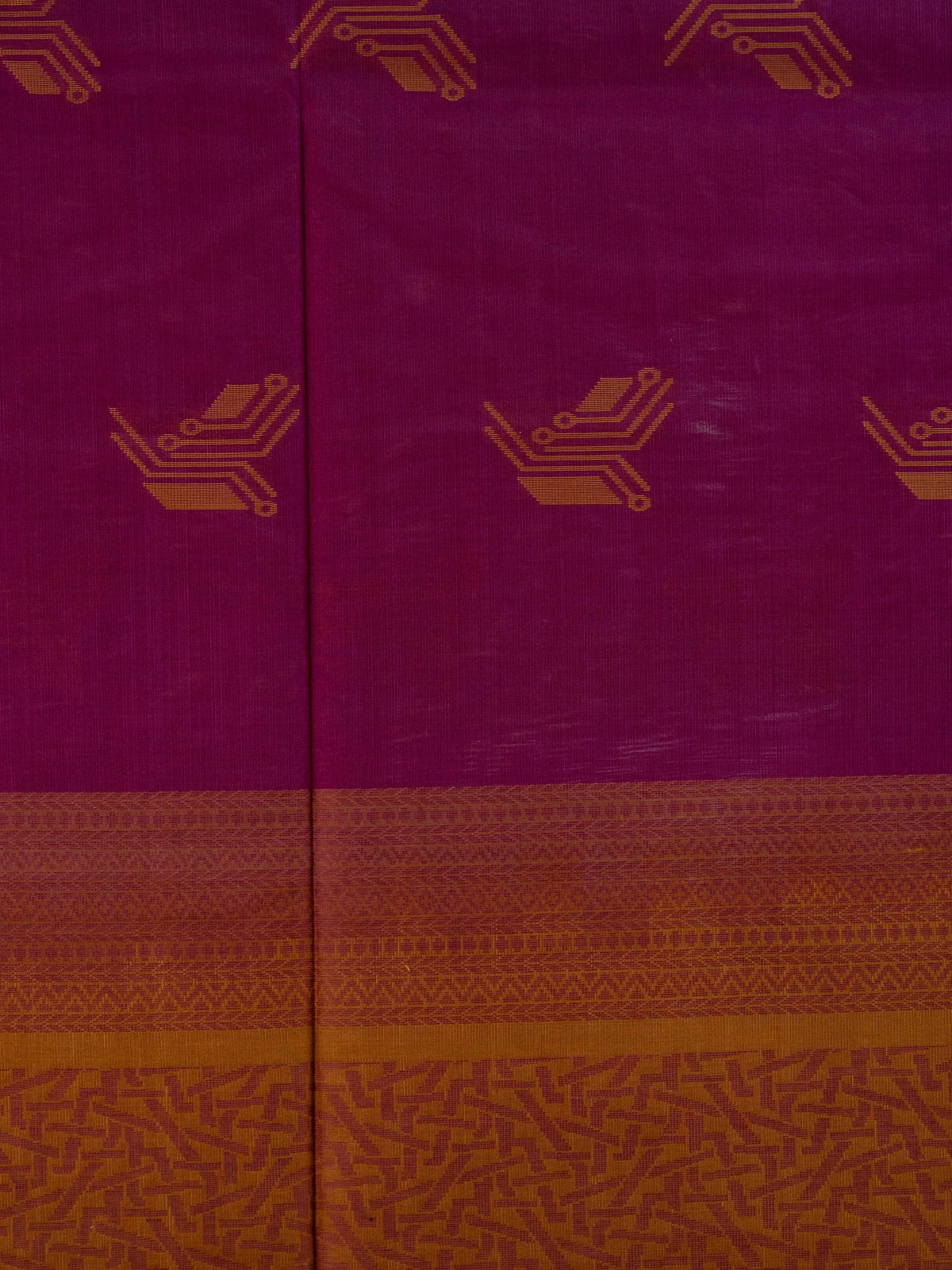 Magenta purple pure silk cotton saree with contrast mustard border, geometric gold buttas and tasselled pallu