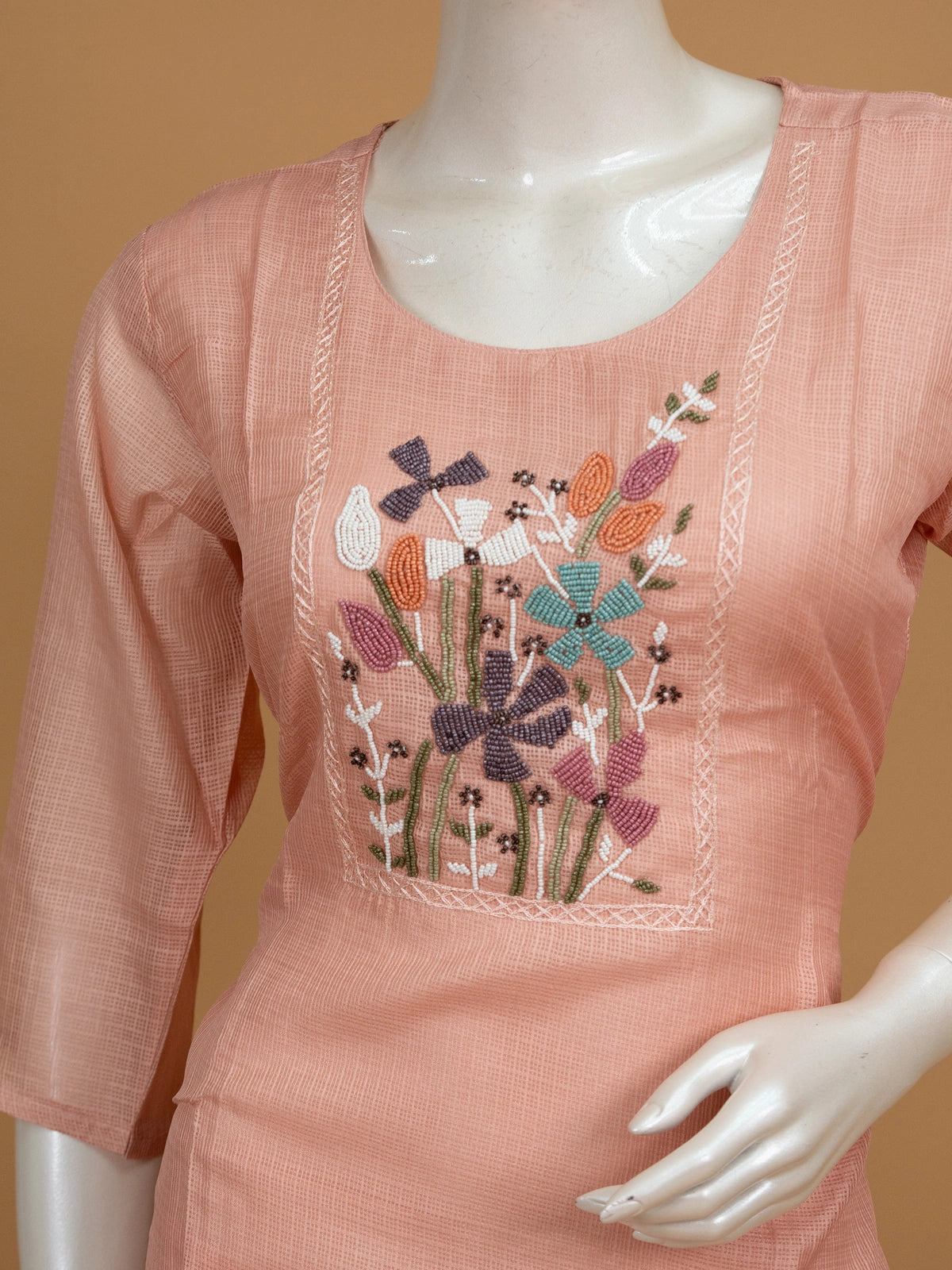 Peach Kota Doria straight cut kurti set with multicolour floral beadwork and embroidered dupatta