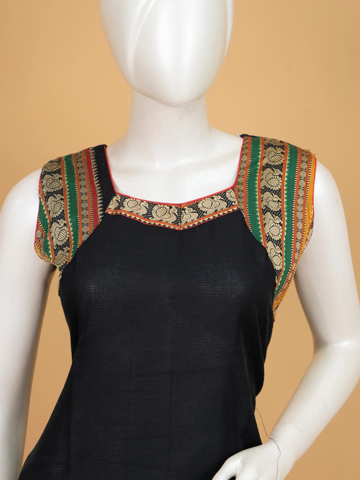 Black cotton straight cut kurti set with peacock woven borders, red pants and multicolour dupatta