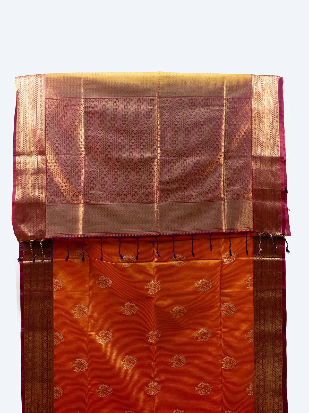 Orange and magenta Vaira Oosi Design semi silk saree with gold zari contrast border and floral buttas