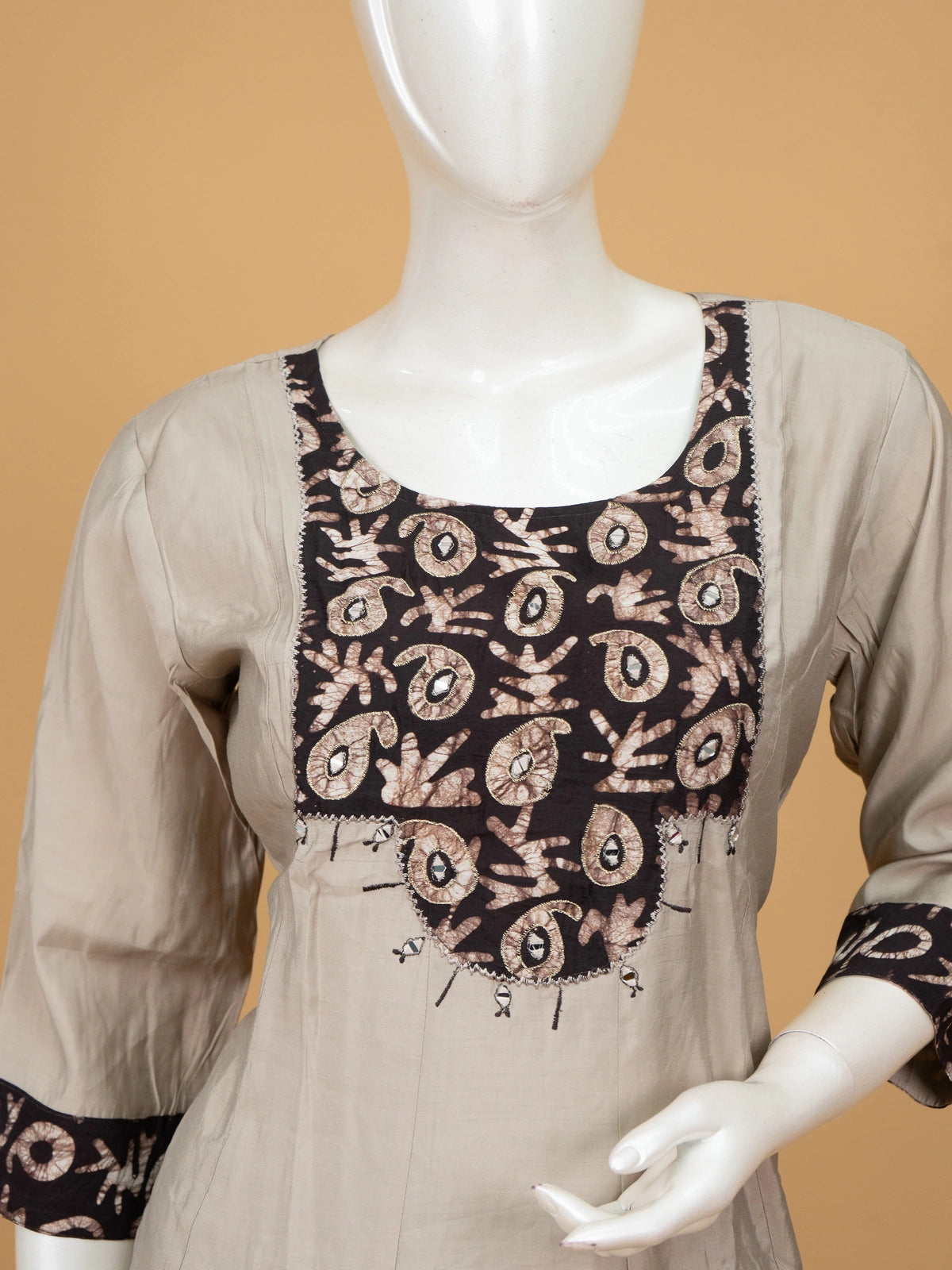 Grey batik cotton A-line kurti set with mirror work yoke and black batik dupatta with gold zari border