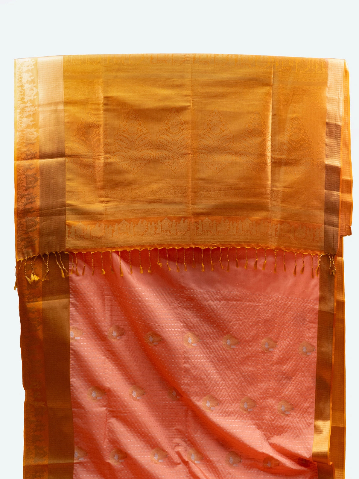 Peach semi silk Vaira Oosi Design saree with mustard-gold contrast zari border and buttas