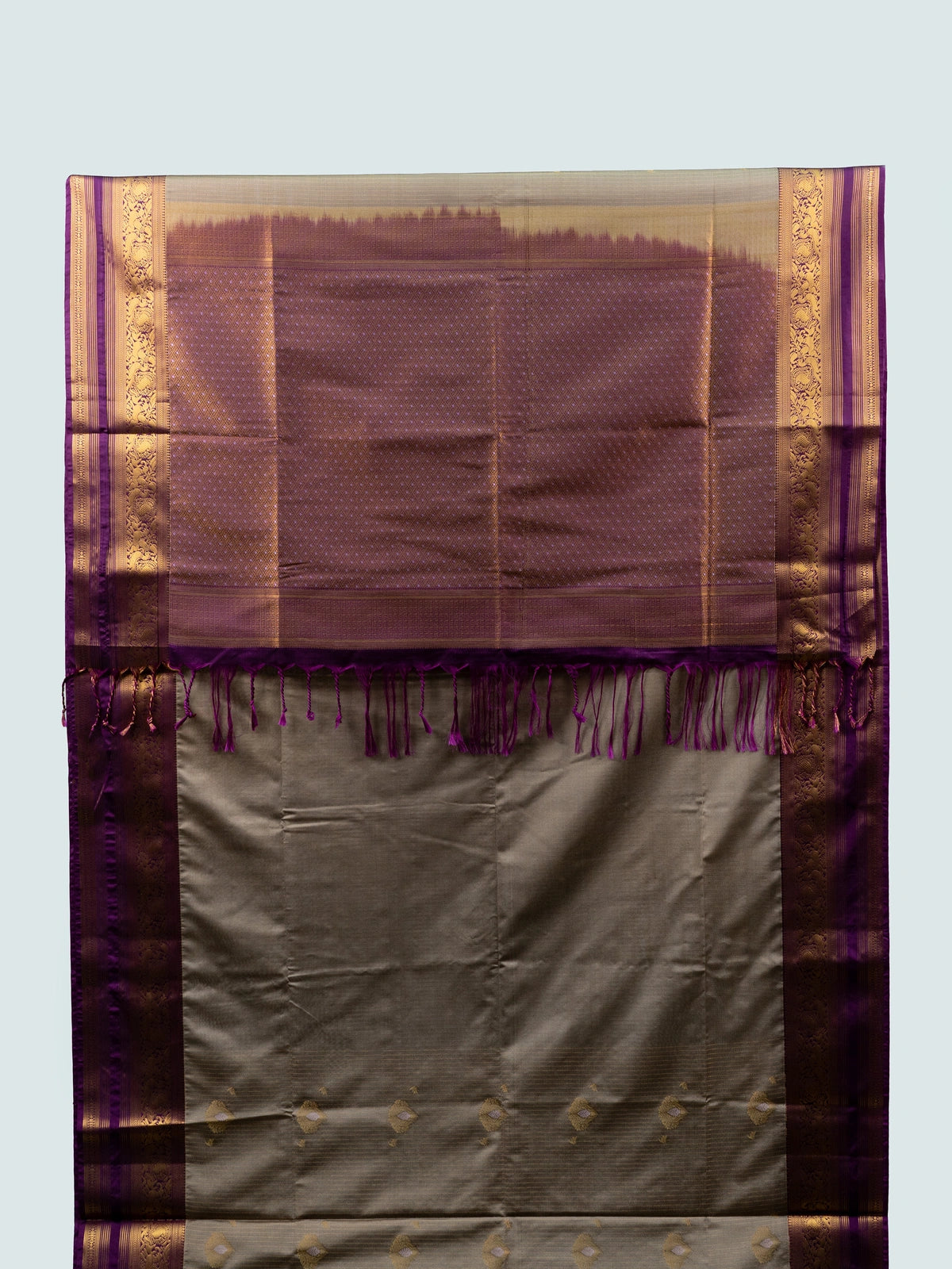 Beige-grey soft silk saree with contrast purple gold zari border and pallu