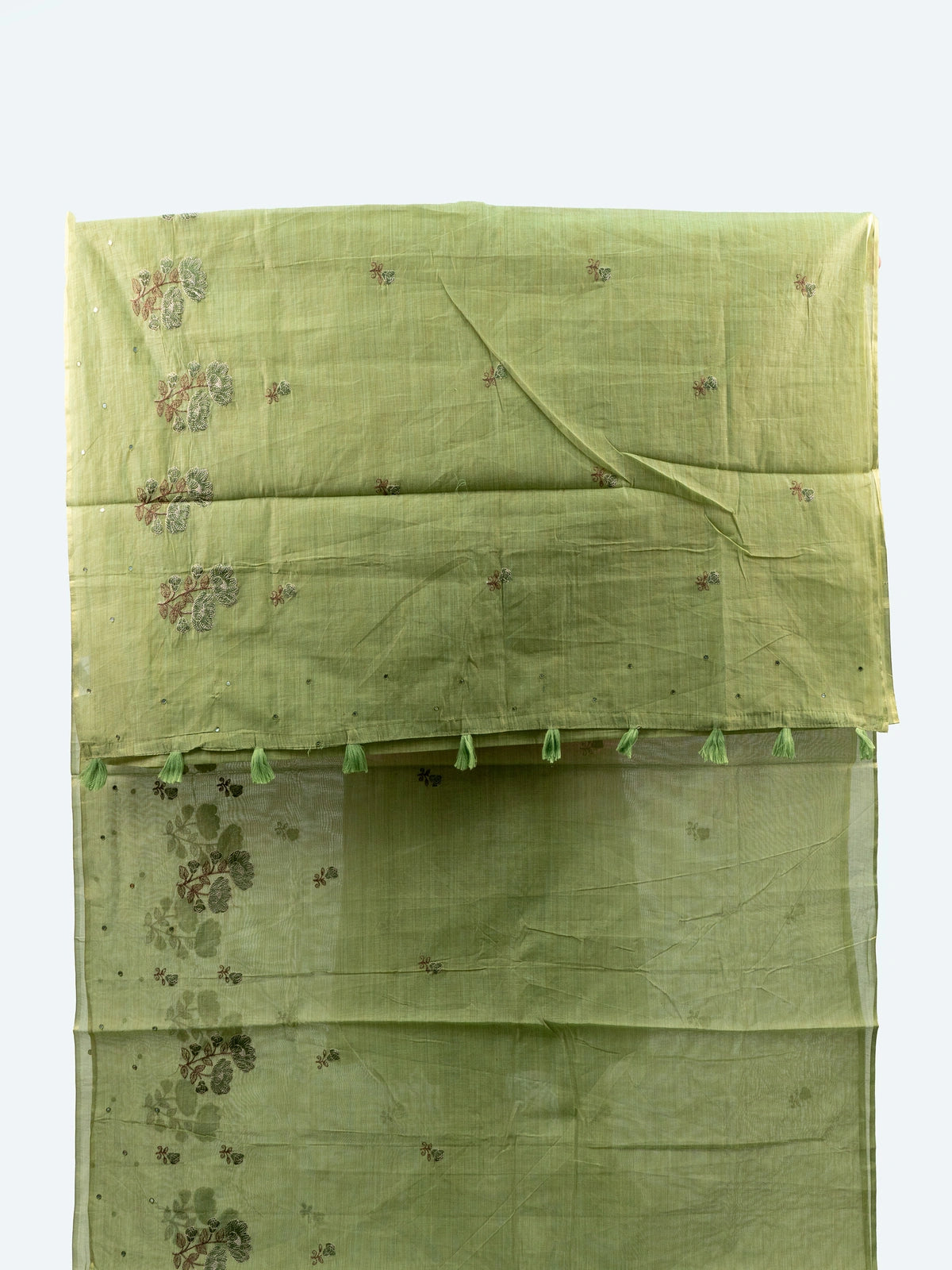 Mehndi green linen cotton saree with floral embroidery and tasselled pallu