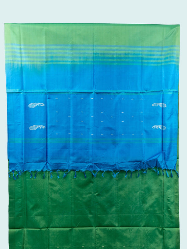 Green banana silk saree with contrast blue pallu, silver paisley motifs and striped border