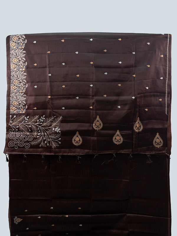 Dark chocolate brown semi raw silk saree with embroidered floral pallu and contrast black blouse