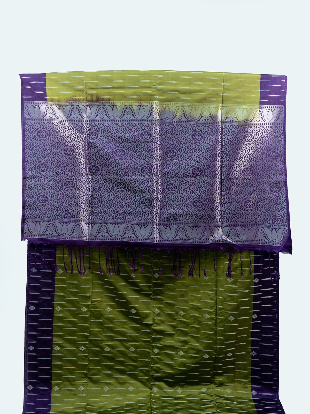 Olive green and purple soft silk saree with silver zari streaks and contrast purple pallu