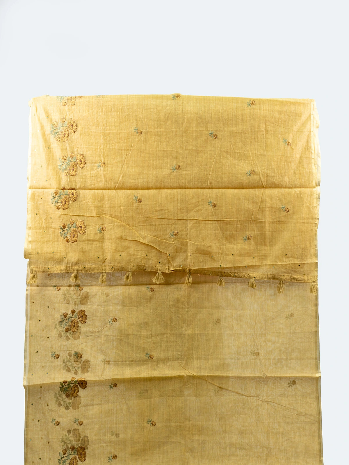 Yellow linen cotton saree with floral embroidered buttas and contrast black blouse