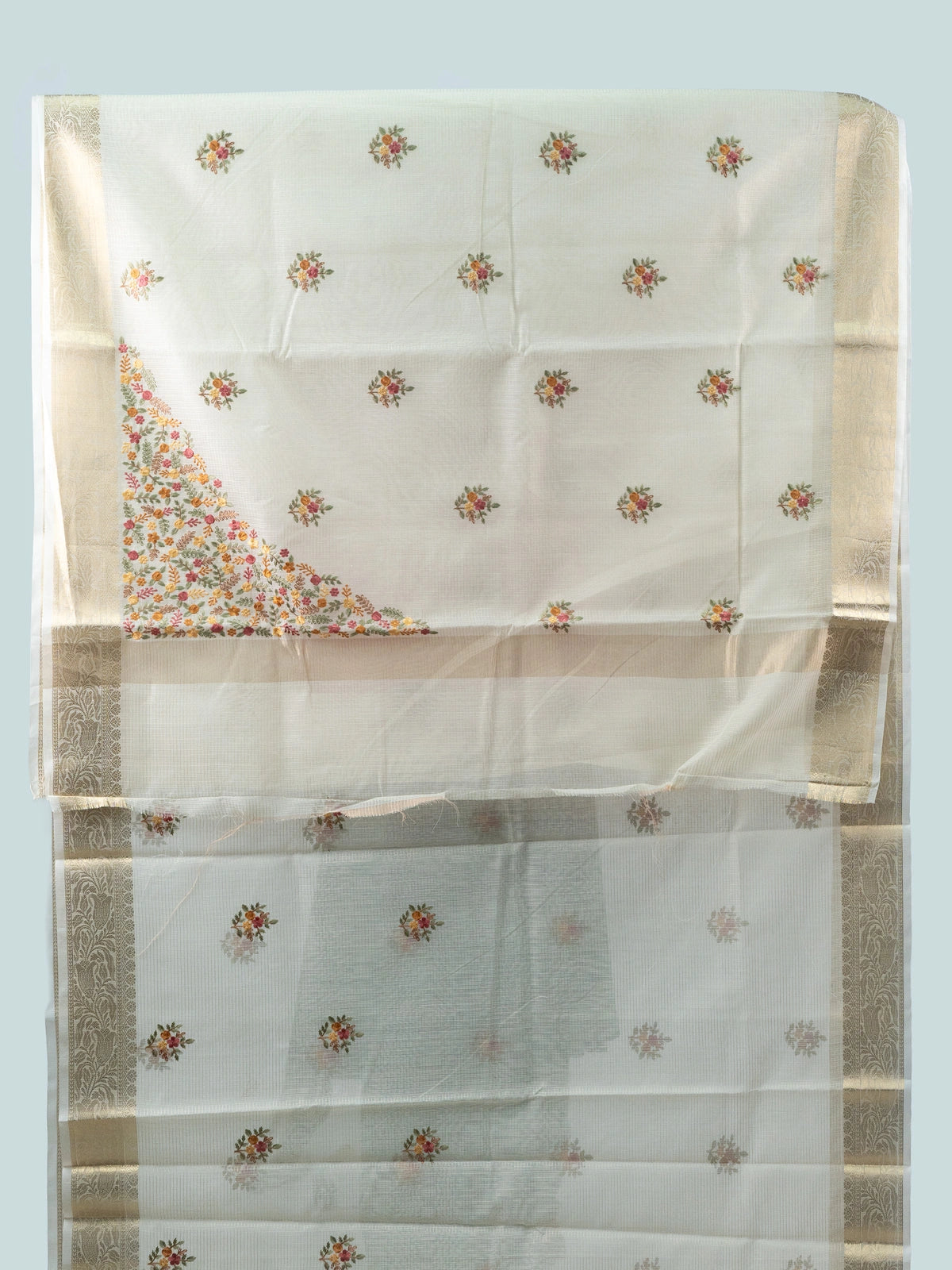Cream linen cotton saree with gold zari border and multicolour floral embroidery