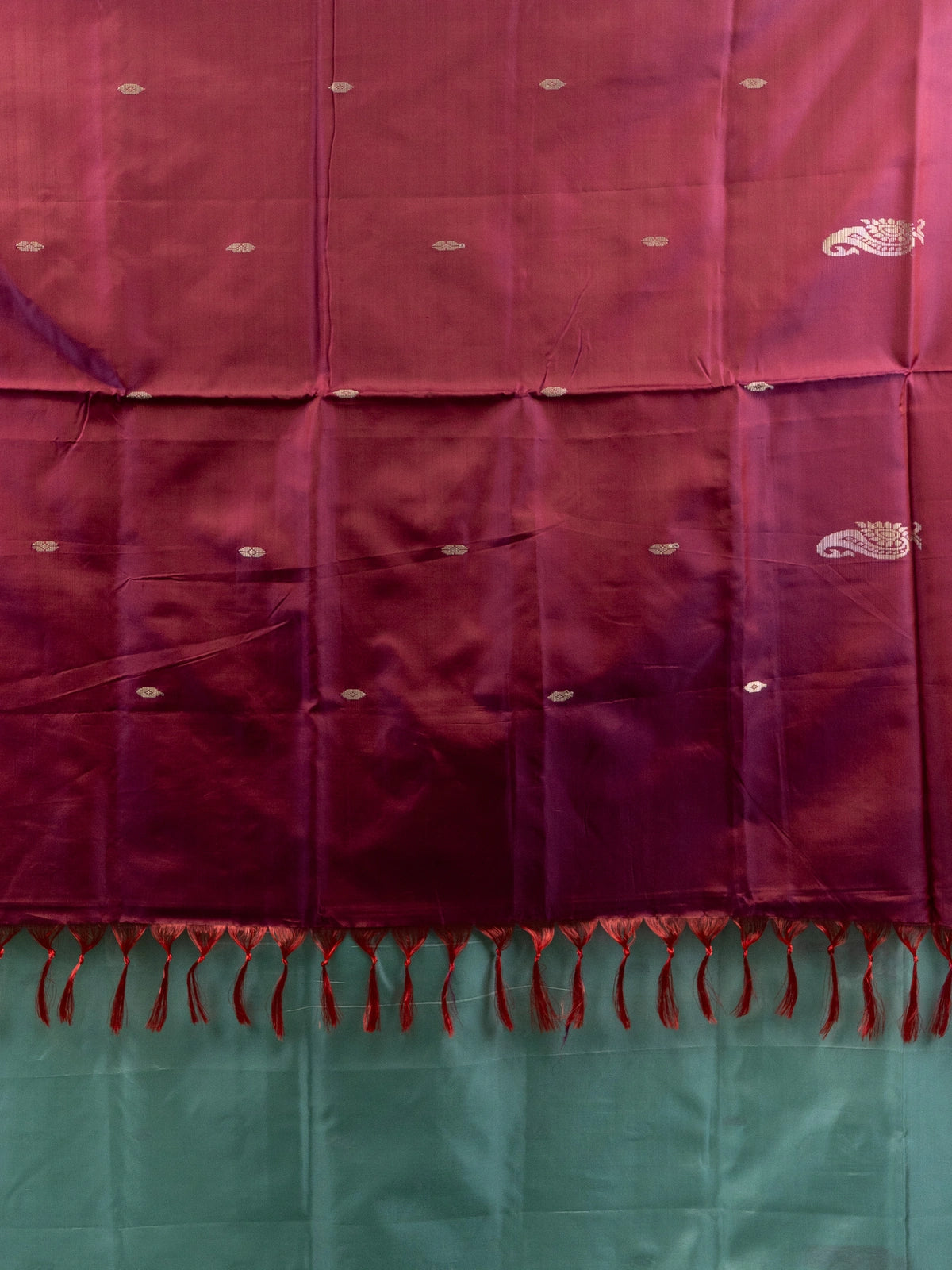 Sea green Banana Silk saree with contrast maroon pallu, paisley butta and silver zari motifs