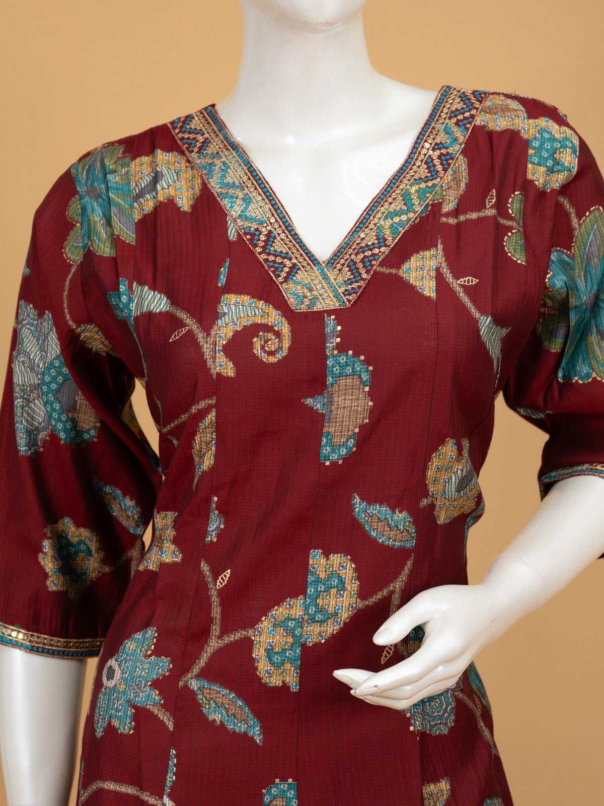 Maroon floral printed A-line kurti set with teal pants and dupatta