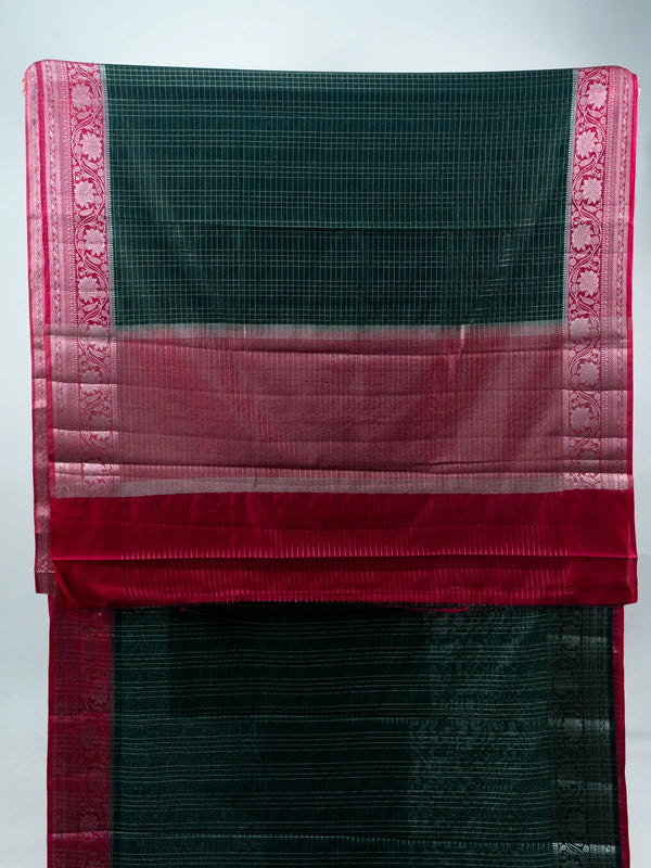 Bottle green semi raw silk saree with silver zari checks and contrast pink floral zari border