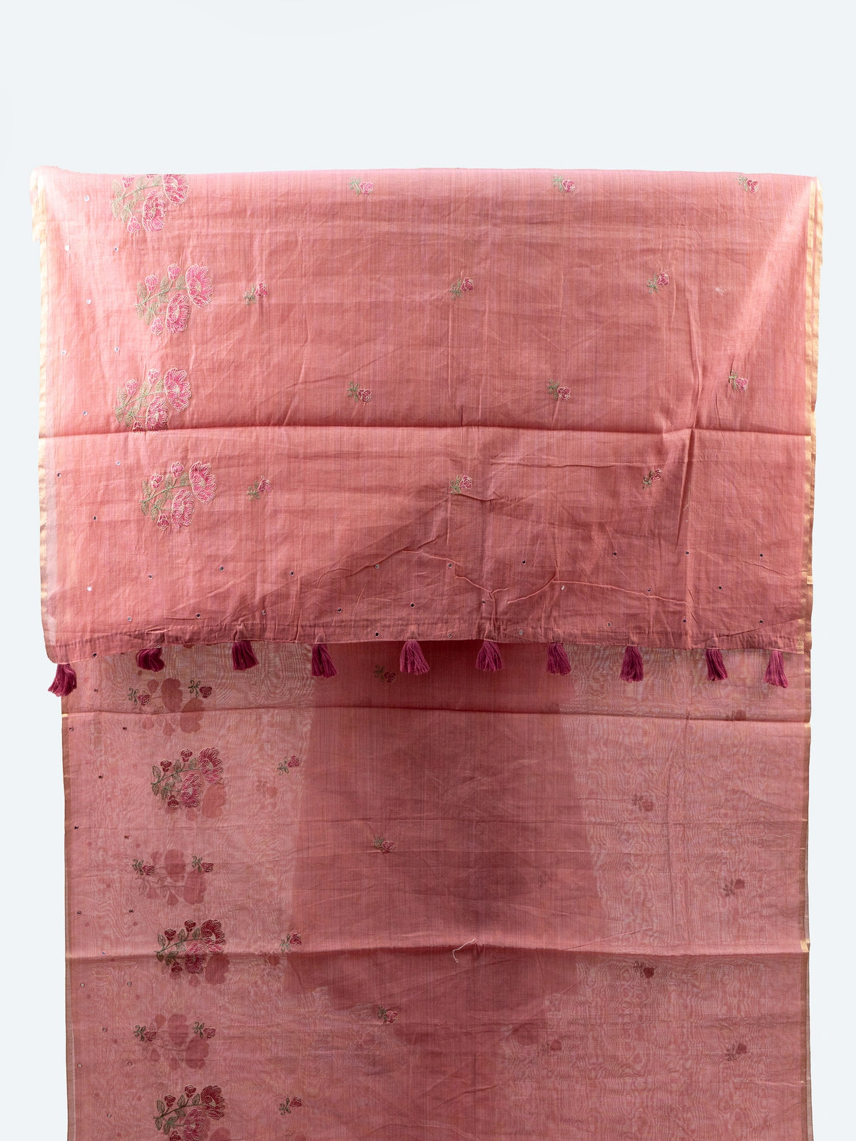 Dusty rose pink linen cotton saree with floral embroidery, sequin work, gold border and tasselled pallu