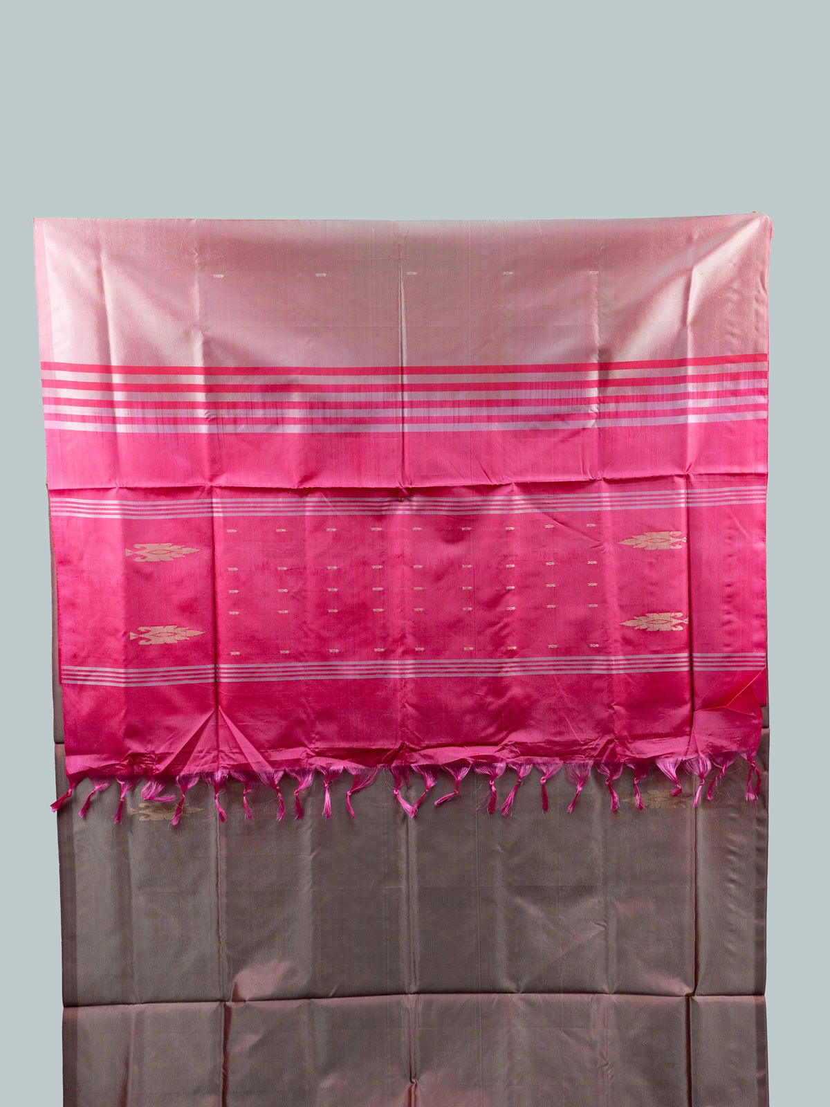 Dusty mauve banana silk saree with contrast pink zari pallu and black embroidered blouse