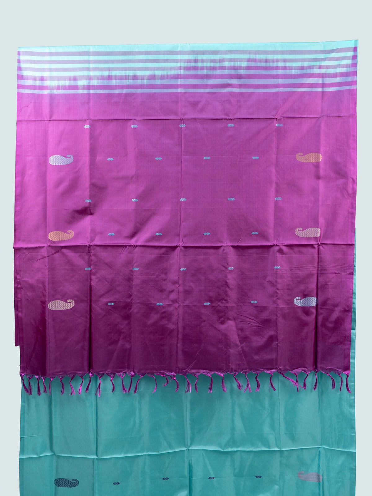 Turquoise blue Banana silk saree with contrast magenta pallu, striped border and paisley buttas
