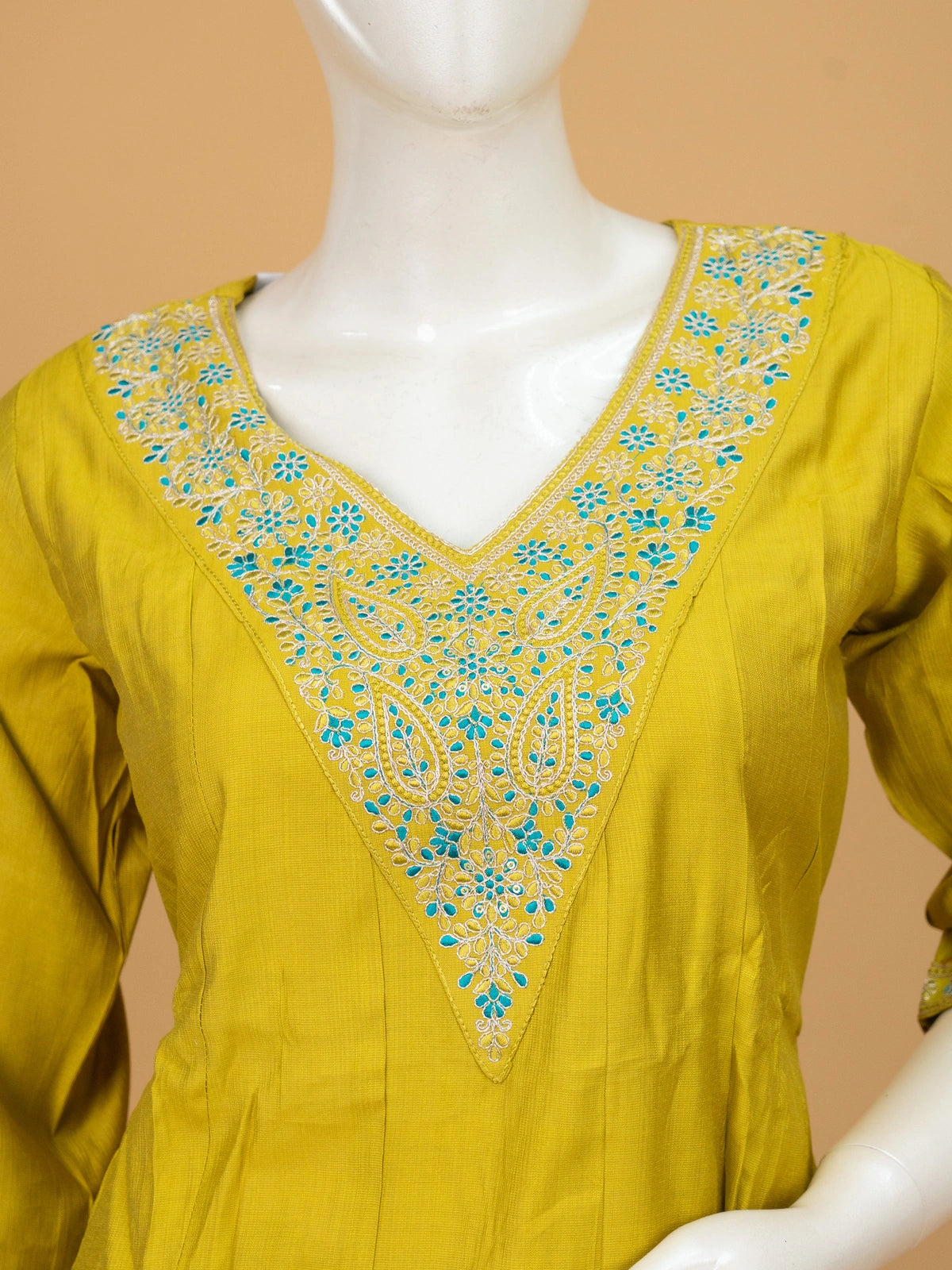 Mustard Yellow embroidered art silk A-line kurti set with turquoise neckline embroidery and paisley print dupatta