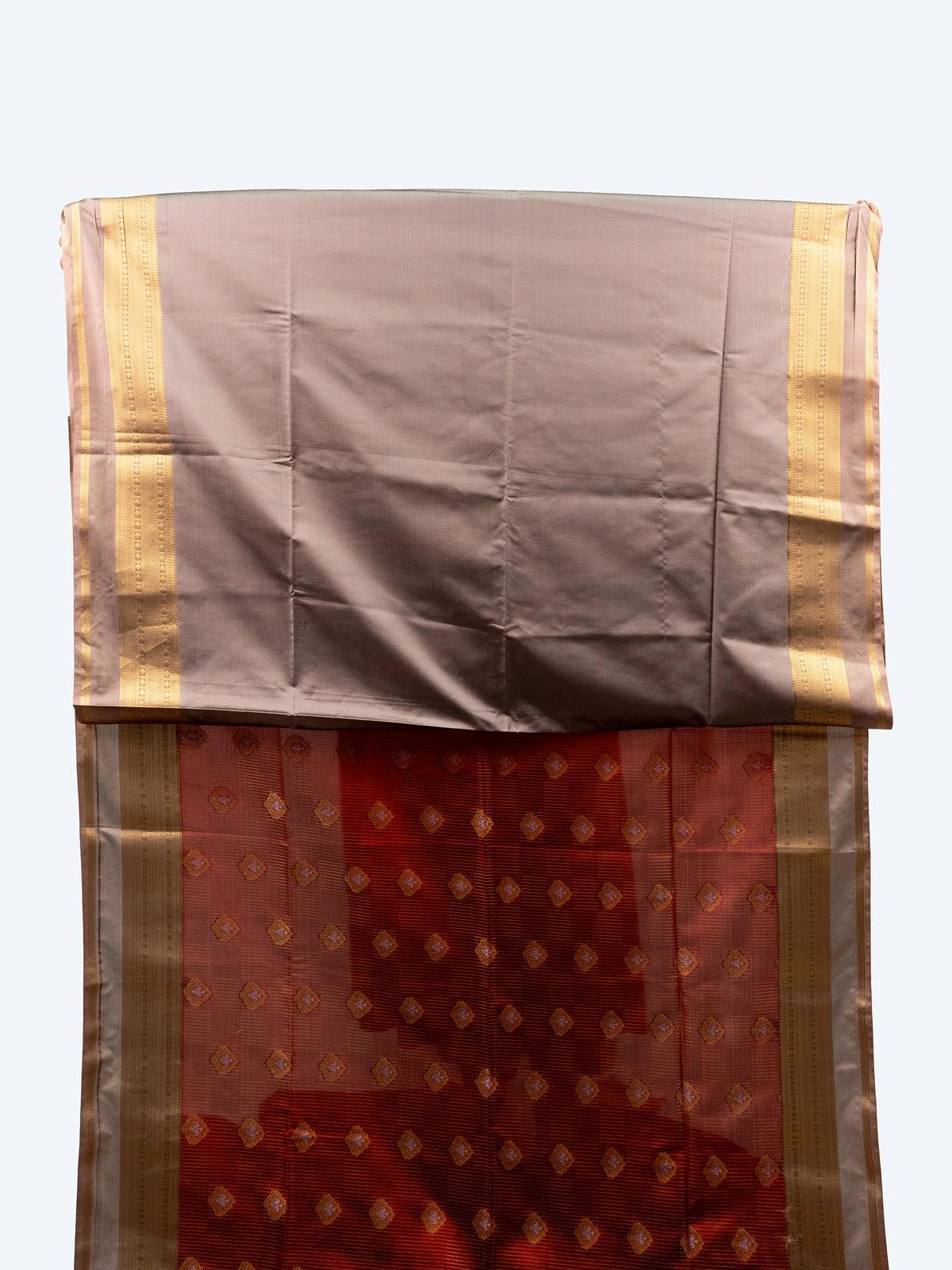 Maroon soft silk saree with gold zari buttas, contrast zari border and cream zari pallu