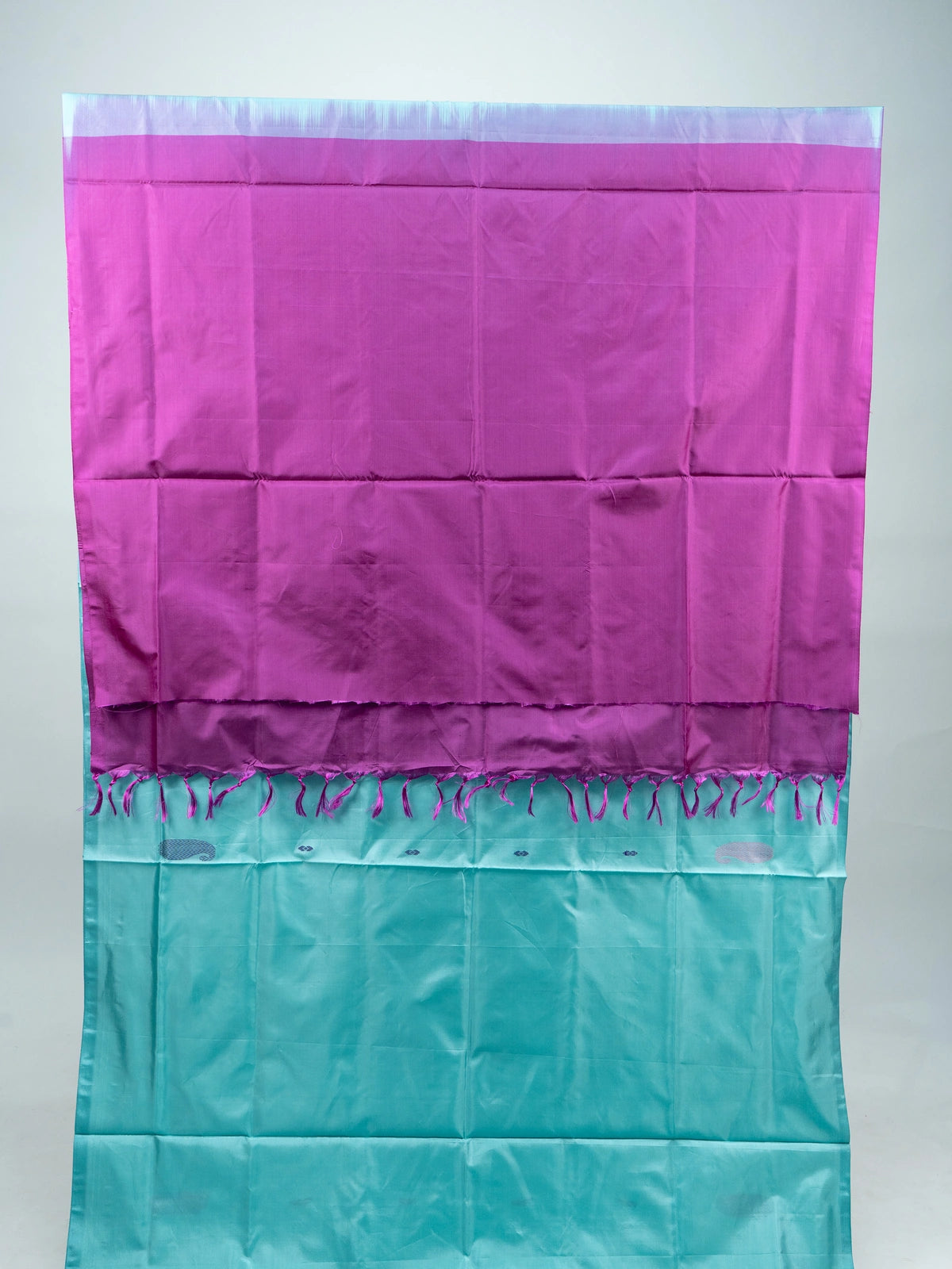 Turquoise blue Banana silk saree with contrast magenta pallu, striped border and paisley buttas