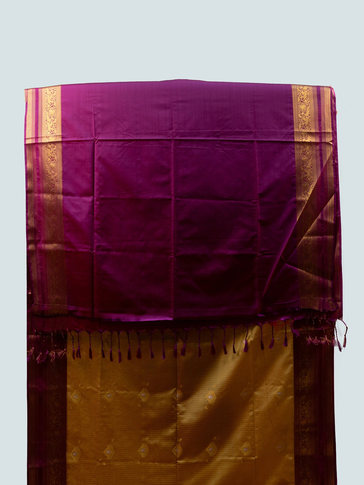 Mustard gold soft silk saree with contrast magenta-purple gold zari border and pallu