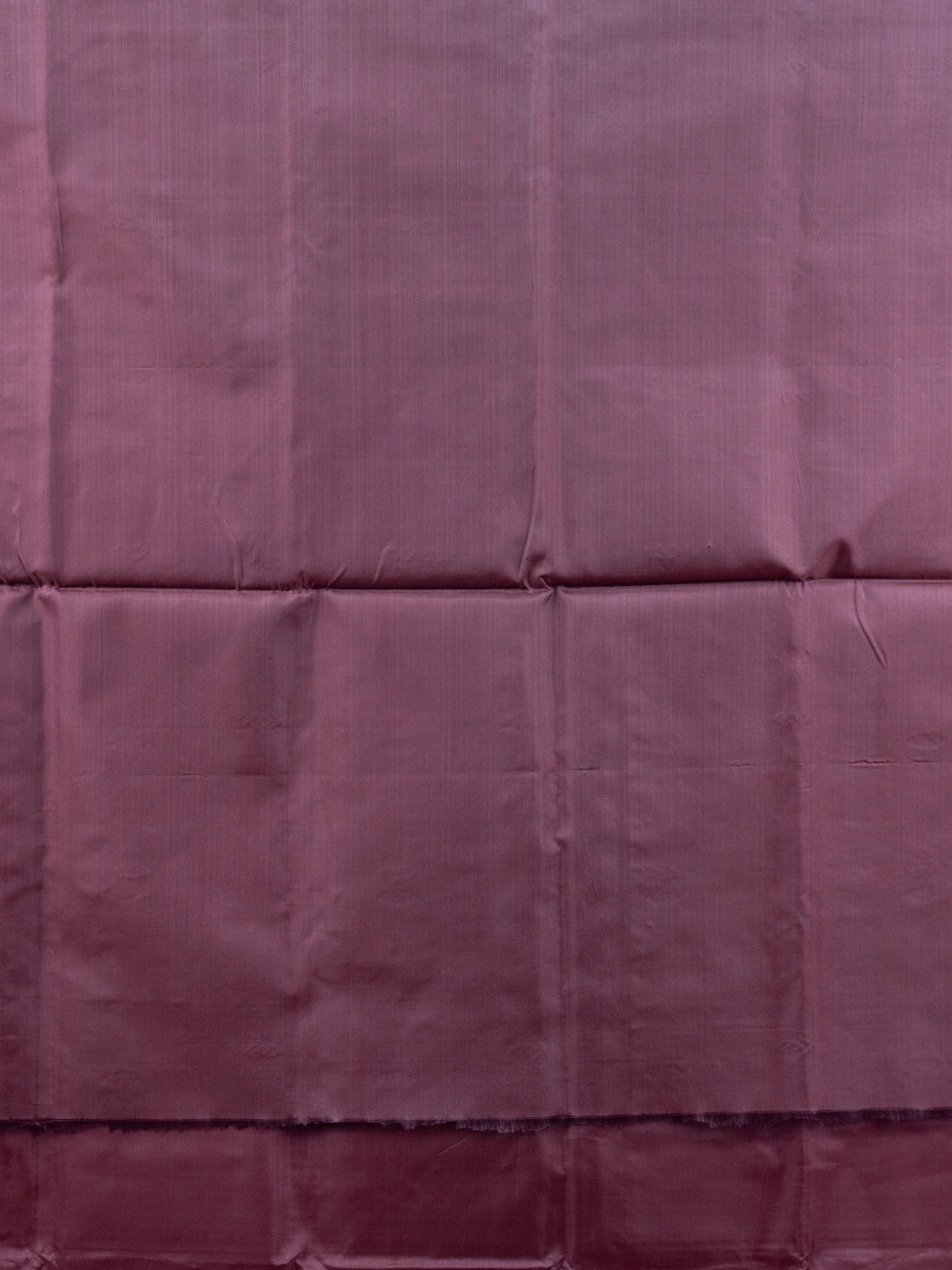 Pink banana silk saree with contrast maroon pallu, woven buti motifs, and black floral blouse